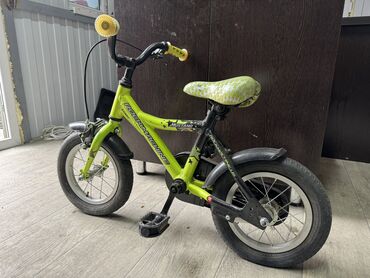 детская литература: Продаю детский велосипед Rockmachine Размер колес 12 Качество