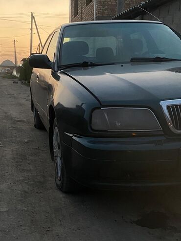 чехлы на пассат: Daihatsu Applause: 1998 г., 1 л, Механика, Бензин, Седан