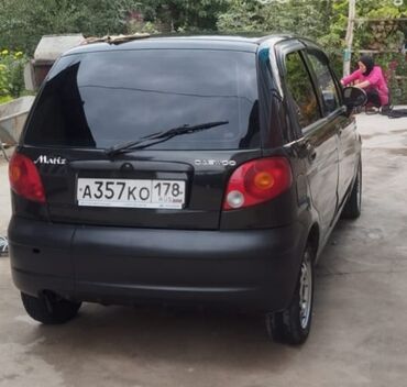 купить двигатель д 245: Автомобиль Daewoo Matiz черного цвета, компактный хэтчбек. Оснащен