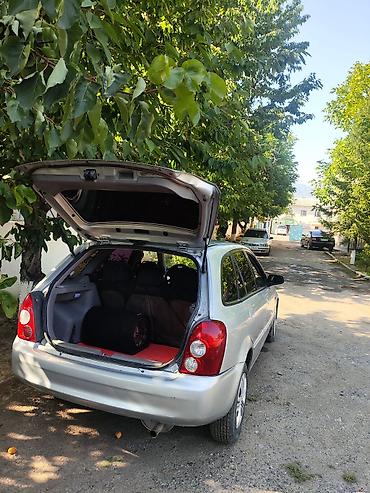 Mazda Familia: 2003 г., 1.6 л, Механика, Бензин, Универсал — 8