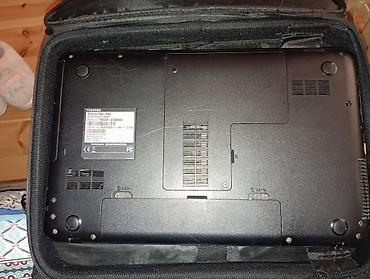 msı laptop fiyatları: Noutbuk - Rəng: qara, üst hissədə incə qırmızı xətt detallı - — 2