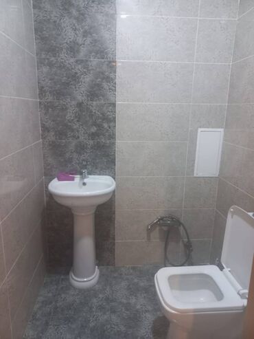 Uzunmüddətli kirayə mənzillər: Səbail rayonu, 20-ci sahədə Socarin binasında 18 mərtəbəli binanın — 10