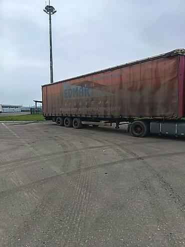 yuk maşnı: DAF XF dartqı (traktor) və tentli qoşqu • Marka/model: DAF XF • — 6