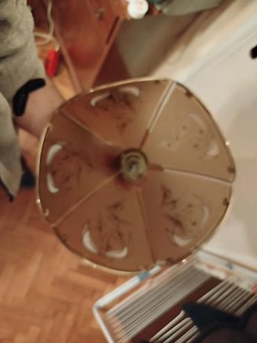 Rasveta: Zuckasti stakleni retro luster Donji kao precnik oko 34 cm. Visina — 3