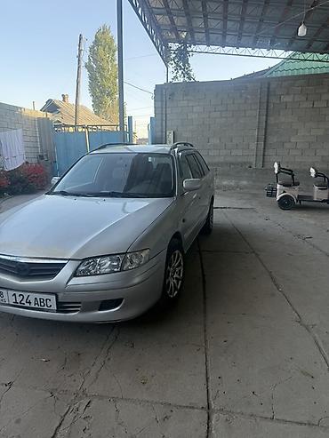 q 7: Mazda 626: 2001 г., 2 л, Механика, Бензин, Универсал — 2