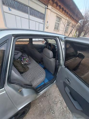 Daewoo: Daewoo Nexia: 2005 г., Механика, Бензин — 12