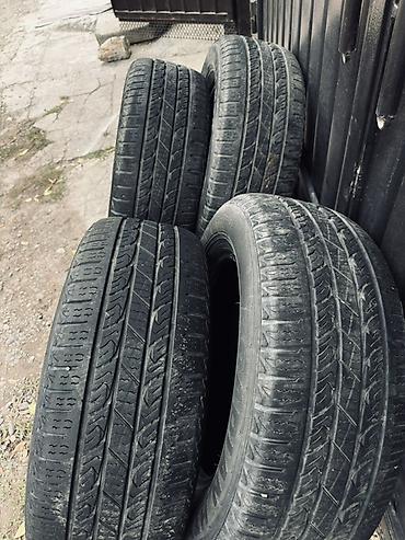 Шины: Шины 265 / R 18, Всесезонная, Б/у, Комплект, Внедорожные (АТ/МТ), Корея, Roadstone — 1