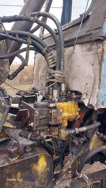 kənd təsərrufatı maşınları: Universaldı ön yükləyici və arxa ekskavator qurğulu traktor - Ön — 9
