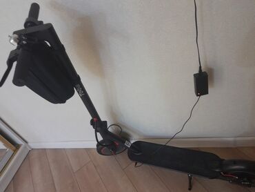 qaçış aparatı satış: Elektrikli skuter – Toba brendi Xüsusiyyətlər: - Qara rəngli, yığcam