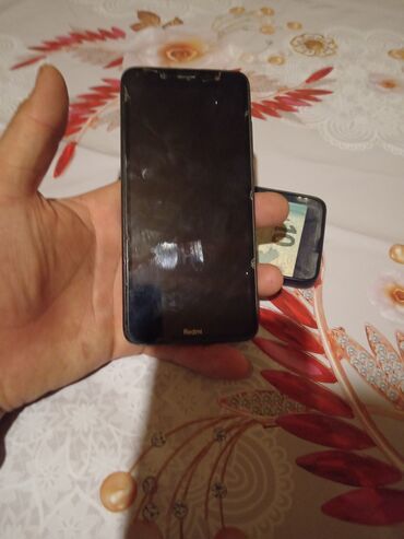 telefon qutuları: Xiaomi Redmi 7A, rəng - Qara