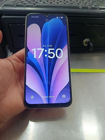 телефон fly f: Redmi 128 ГБ, цвет - Розовый, Отпечаток пальца — 2