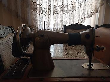 gitara temiri: Mexanik tikiş maşını – çarxlı (ayaq pedalı ilə və ya əl çarxı ilə — 2