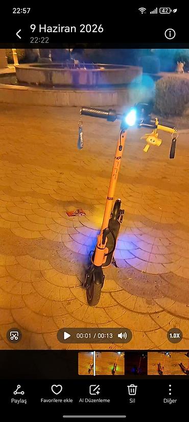 skuter alıram: Elektrik skuter – parlaq narıncı rəng, şəhər sürüşü üçün ideal — 4