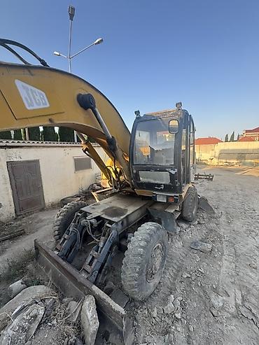 Ekskavatorlar: JCB təkərli ekskavator - Marka/model: JCB (təkərli ekskavator) - İş — 1