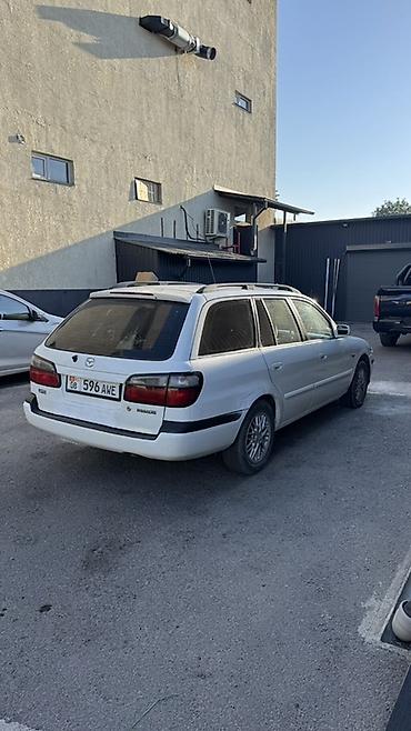 мото зонтик: Mazda Capella: 1999 г., Универсал — 5