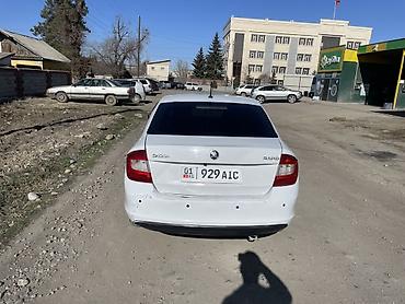 e53 amg: Skoda Rapid: 2015 г., 1.6 л, Автомат, Седан — 4
