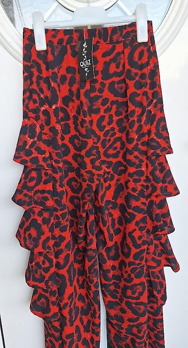 lc waikiki baletanke za devojcice: Pantalone za žene, veličina S-M, sa upečatljivim leopard dezenom u — 3