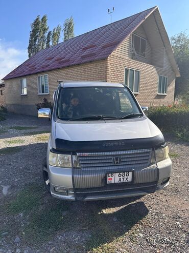 машина женская: Honda Stepwgn, правый руль, серебристый минивэн. Основные
