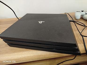 oyun direksiyonu: PlayStation 4 Pro oyun konsolu. Əla vəziyyətdə, 2 orijinal pultla - — 1