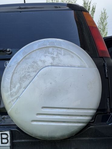 ашерви хонда: Крышка для запаски 
Состояние среднее на фото видно
Без замочек
