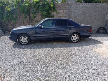 MERSEDES E 230. 2.3L sadə mator 1996 ünd göy rəngli Mercedes-Benz