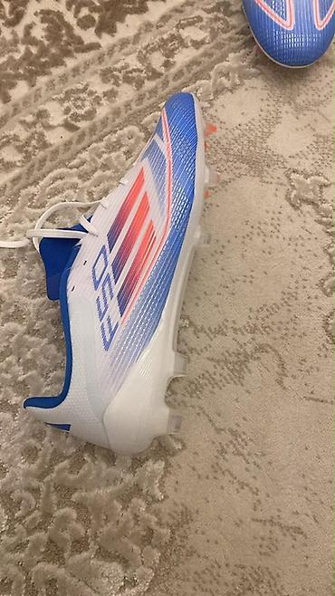 Бутсы: Məhsul: Adidas kişi futbol butsası - Model: X Speedflow (etiketdə — 2