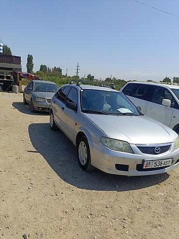 мицу биси: Mazda 323: 2002 г., Механика, Бензин, Универсал — 2