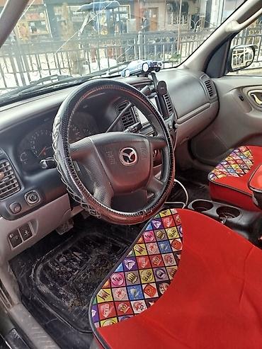 Mazda: Mazda Tribute: 2003 г., 3 л, Автомат, Газ, Кроссовер — 7