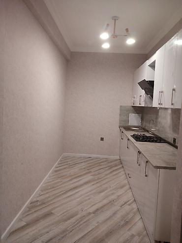 Otaqların satışı: Yeni Yasamalda Albali usag baxcaxinin üstündə Araz marketin binasinda — 12