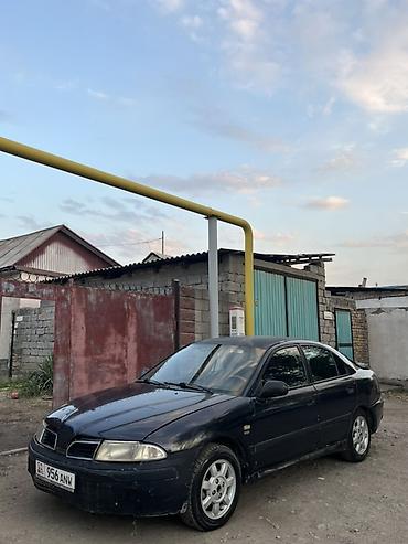evo 2: Mitsubishi Carisma: 1999 г., 1.8 л, Автомат, Бензин, Седан — 3