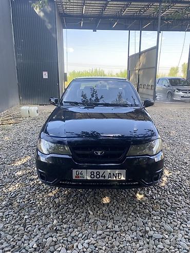салон автомобиля: Daewoo Nexia: 2011 г., 1.5 л, Седан — 2