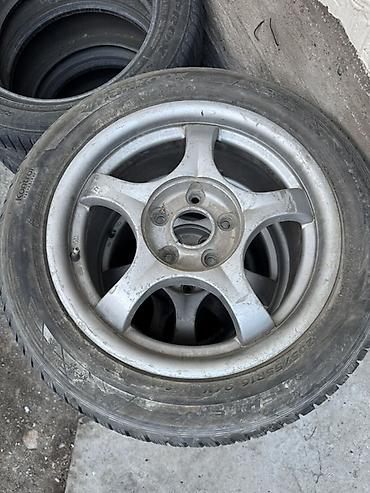 Шины и диски: Комплект зимних шин Hankook со штатными литыми дисками. - Тип: зимние — 2