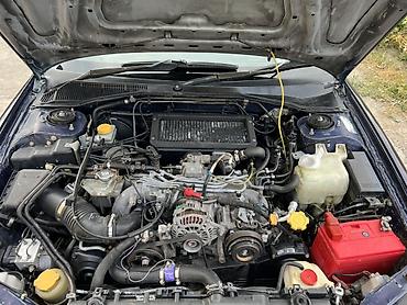 рум разбрасыватель: Subaru Legacy: 2000 г., 2 л, Автомат, Бензин, Седан — 5