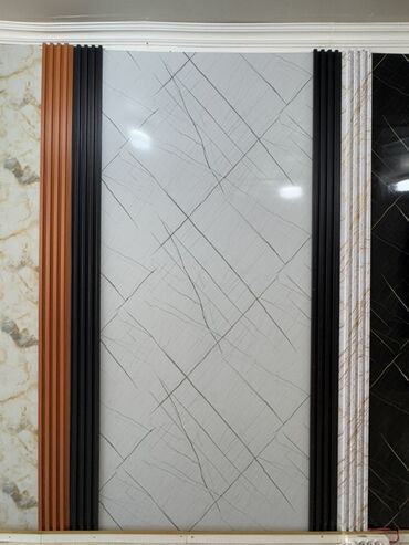 Digər tikinti materialları: Divar bəzəyi üçün nəzərdə tutulmuş bu bəzək paneli ağ rəngdədir və