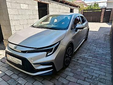byd e2 2024: Toyota Corolla: 2023 г., 1.8 л, Вариатор, Гибрид, Седан — 7