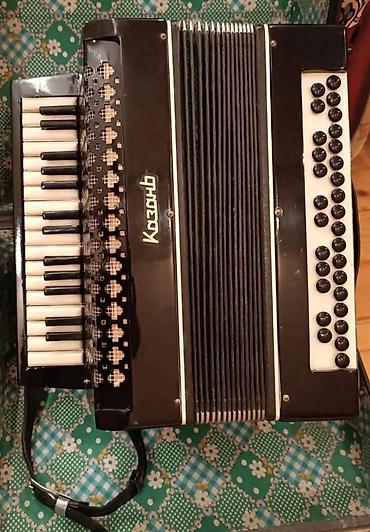 Qarmon, Akustik, İşlənmiş, Ünvandan götürmə