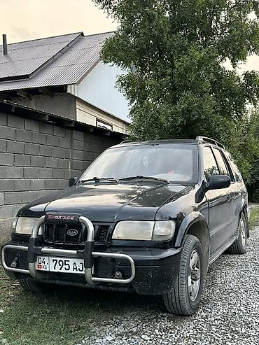 bud e9: Kia Sportage: 2003 г., 2 л, Механика, Бензин, Внедорожник — 1