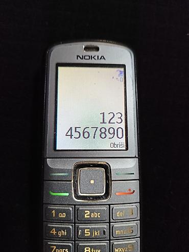 mali blender: Nokia klasični mobilni telefon sa fizičkom tastaturom - Model iz — 4