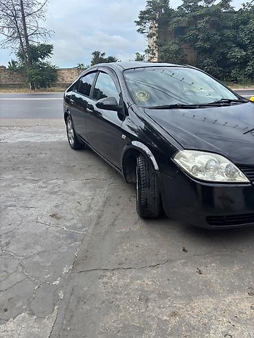 Транспорт: Nissan Primera: 2 л | 2005 г. Седан — 3