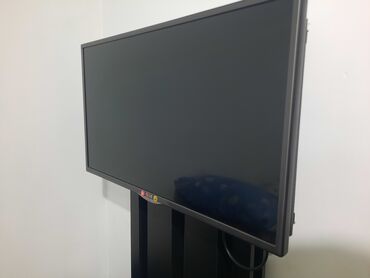 Телевизоры: Телевизор LG на напольной стойке + тумба под ТВ - Экран: плоский
