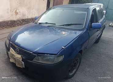 уна тетиктери: Mazda Familia: 2002 г., 1.5 л, Автоматические, Бензин, Хэтчбэк