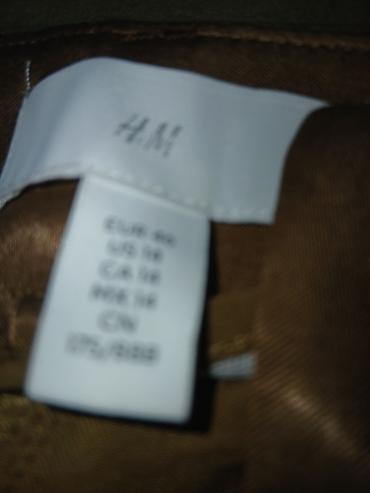 h: Braon nove od pravog satena H&M pantalone na slikama prikazuje — 3