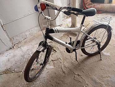 grand bicycle: Uşaq velosipedi satılır. Velosiped gümüşü rəngdədir və üzərində — 2