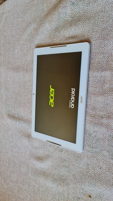 Tableti: Tablet sa belim okvirom i metalnim zadnjim poklopcem, dijagonala — 10