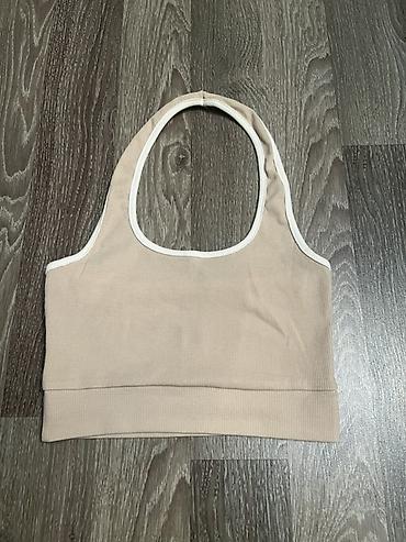 Qadınlar üçün ribli top – bej rəngdə - Stil: halter kəsimli, oval ön lalafo.az -da Qadınlar üçün ribli top – bej rəngdə - Stil: halter kəsimli, oval ön
