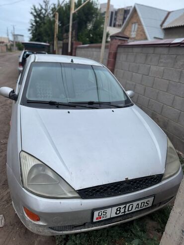 эссенциале форте цена бишкек: Автомобиль Ford Focus серебристого цвета, представленный в кузове