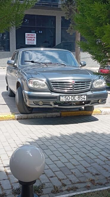 QAZ: QAZ Volga 31105 sedan - Kuzov: tünd boz rəng, 4 qapı, xrom ön — 3