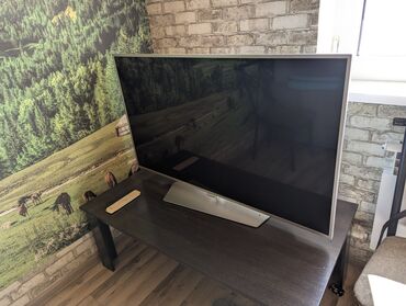 телефон филипис: LED-телевизор Philips, диагональ примерно 55". Тонкая серебристая