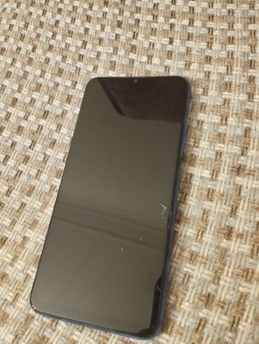 islenmis telefonlar ucuz qiymete: Xiaomi Redmi 9T, 128 GB, rəng - Göy, 
 Sensor, Barmaq izi, İki sim kartlı