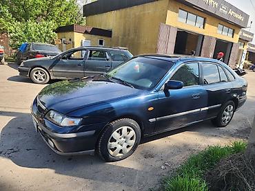 exeed lx: Mazda 626: 1999 г., 1.8 л, Автомат, Бензин, Седан — 5